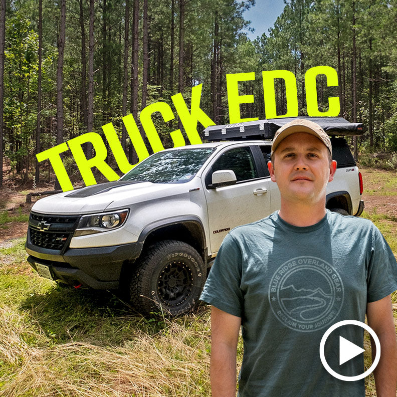 Truck EDC: Best Ways To Organize Your Gear (man stands in front of truck with the words: "Truck EDC" behind him)